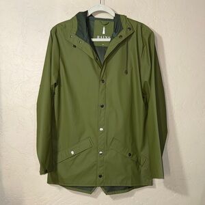 Rains Unisex Waterproof hooded Jacket snap front in a olive army green color